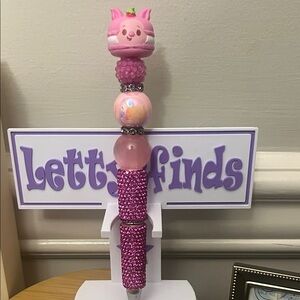 Pink Beaded Pen with piglet Disney munchling topper